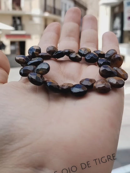 Pulsera de ojo de tigre tallada de diseño
