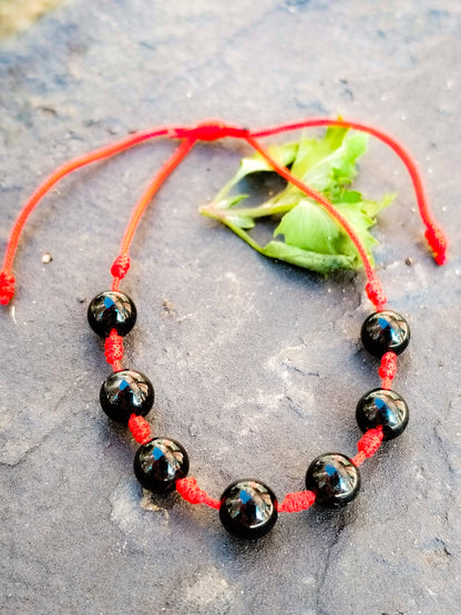 Pulsera de Los siete Nudos de Protección roja con bolas de Shungit