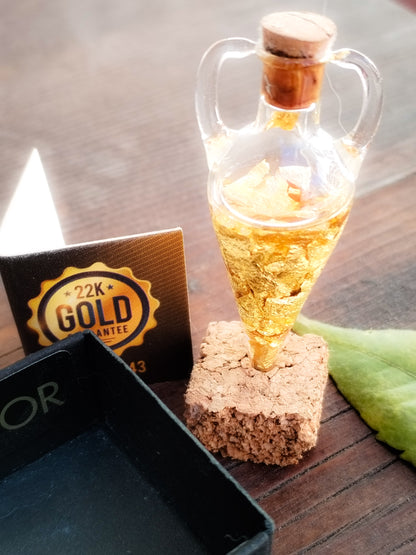 Oro auténtico en botellita